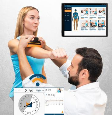 Physical therapist helping a client balance on a platform in a bright gym