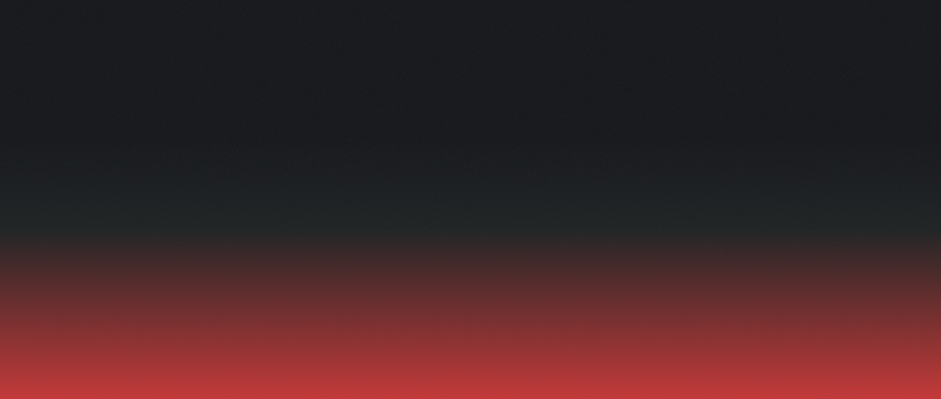Gradient of dark gray fading into red.