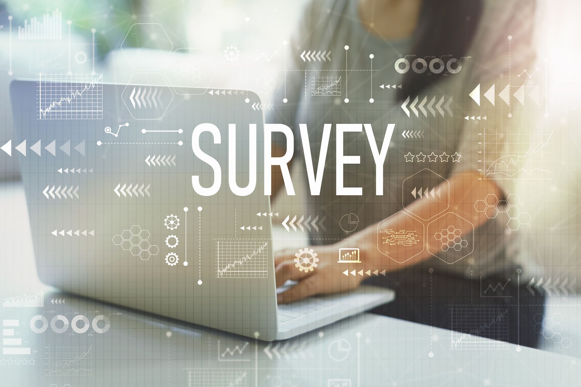 Woman taking a survey on a laptop