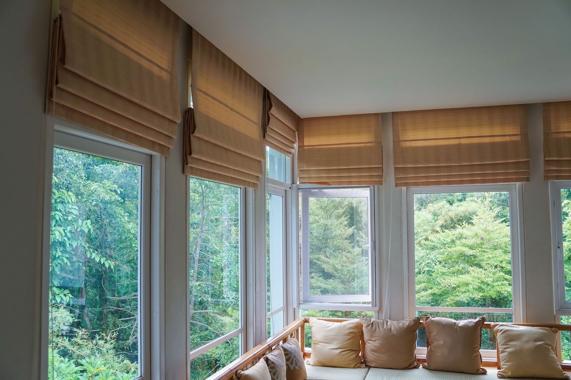 brown roman blind shade curtain tree