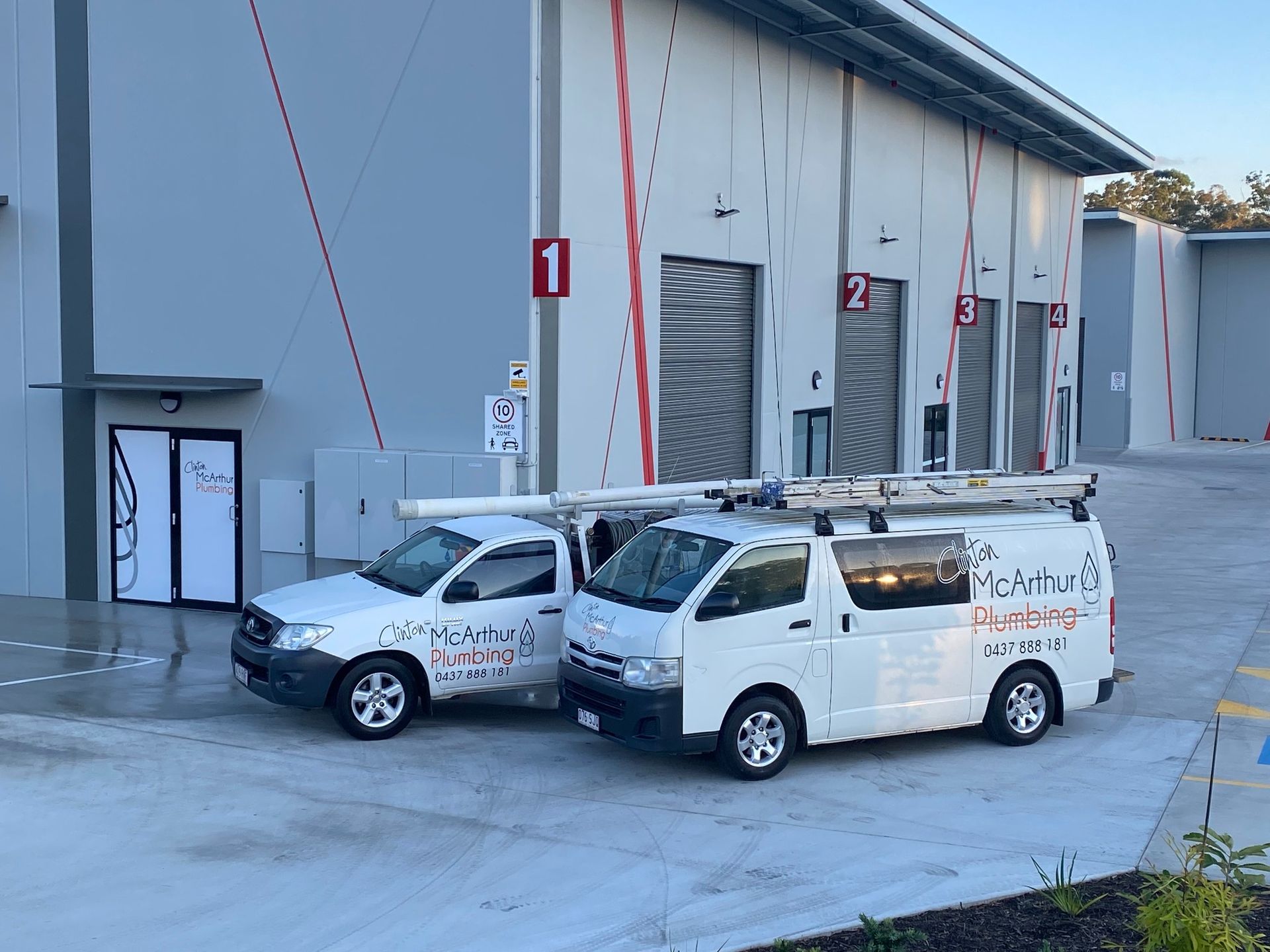 A Person is Fixing a Sink Pipe With a Wrench — Clinton McArthur Plumbing in Landsborough, QLD