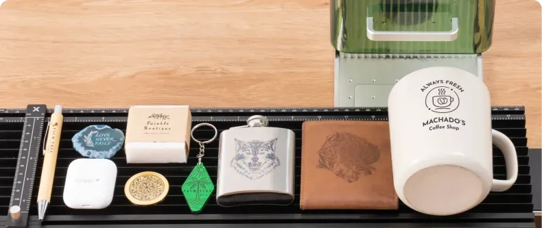 A table topped with a variety of items including a mug and a flask.
