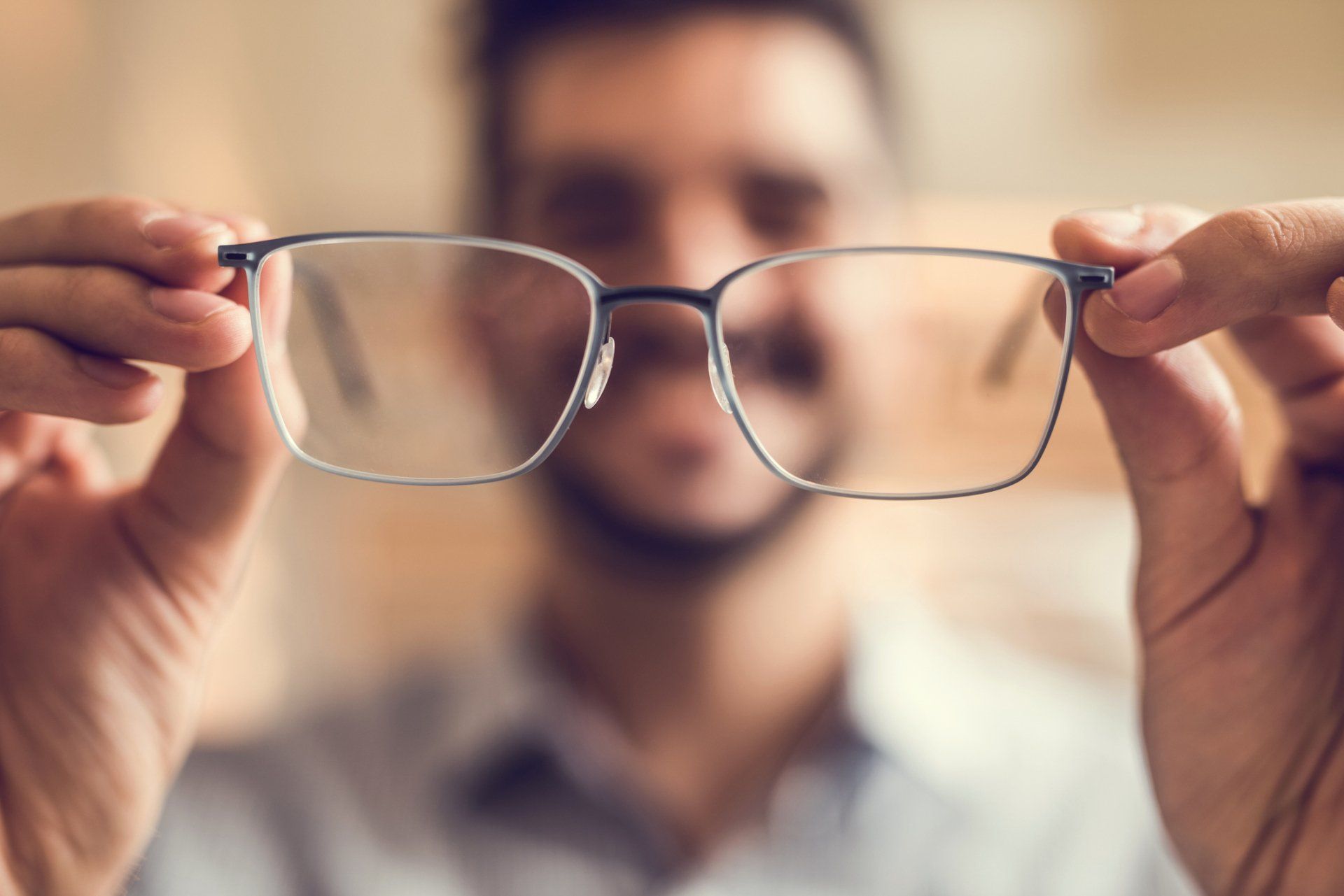 Female doctor checking patients eyes — Laurinburg, NC — Laser Eye Institute PA