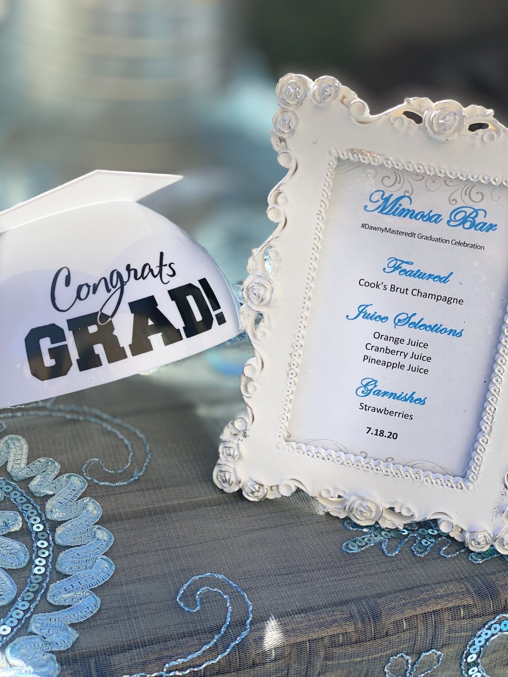 Graduation decorations: mortarboard, ornate frame with