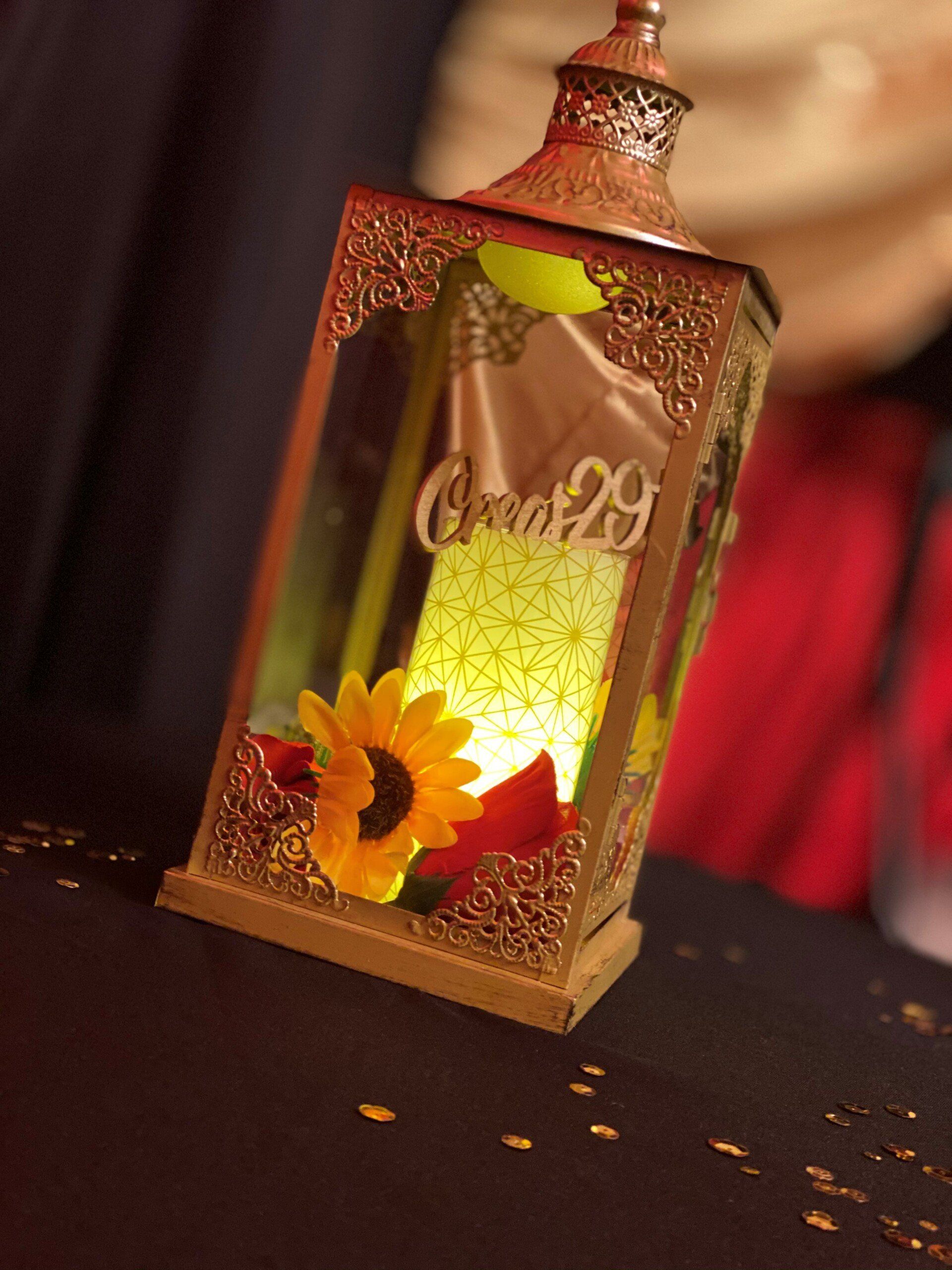 Gold lantern with sunflower and