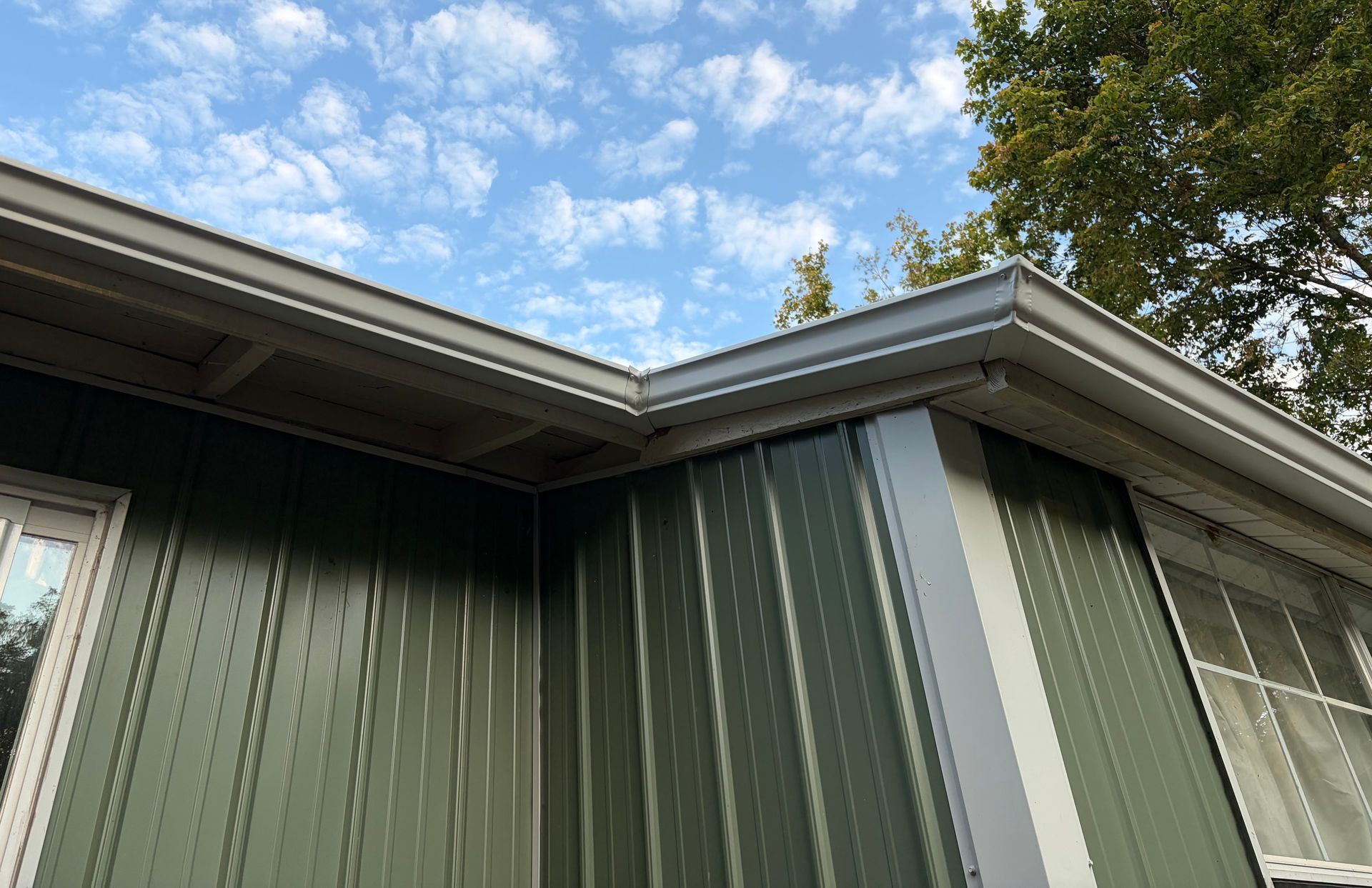 Hog Trough Seamless Gutters installed gutter and facia on this house