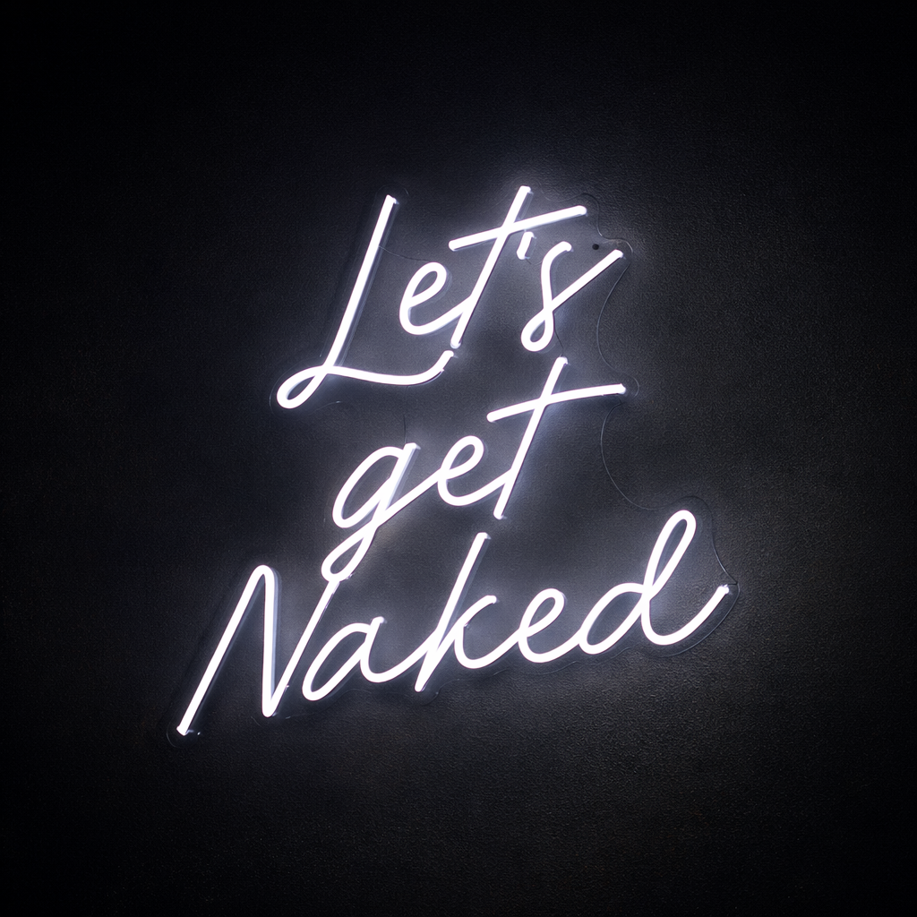 White neon sign on a black background that reads