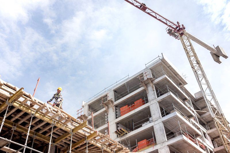 Two Construction workers working on a construction site in Texas and Louisiana.