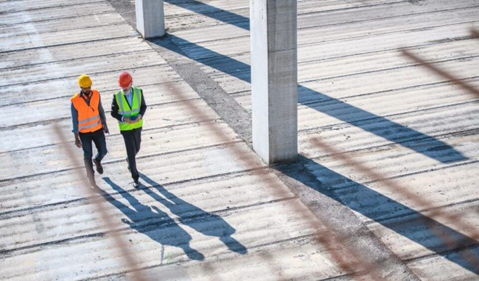 Two Construction workers working on a construction site in Texas and Louisiana.