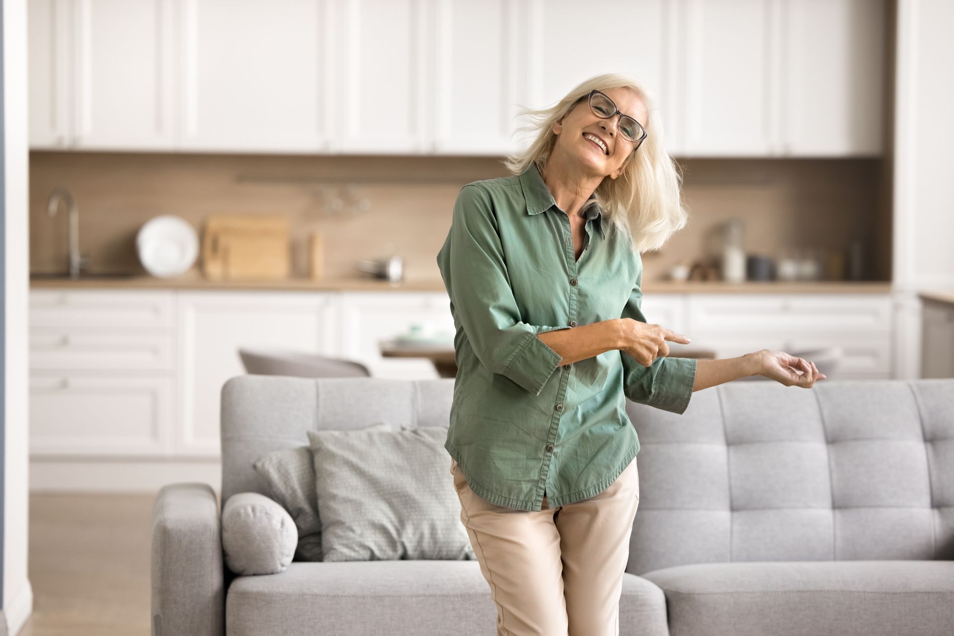 happy older woman dancing