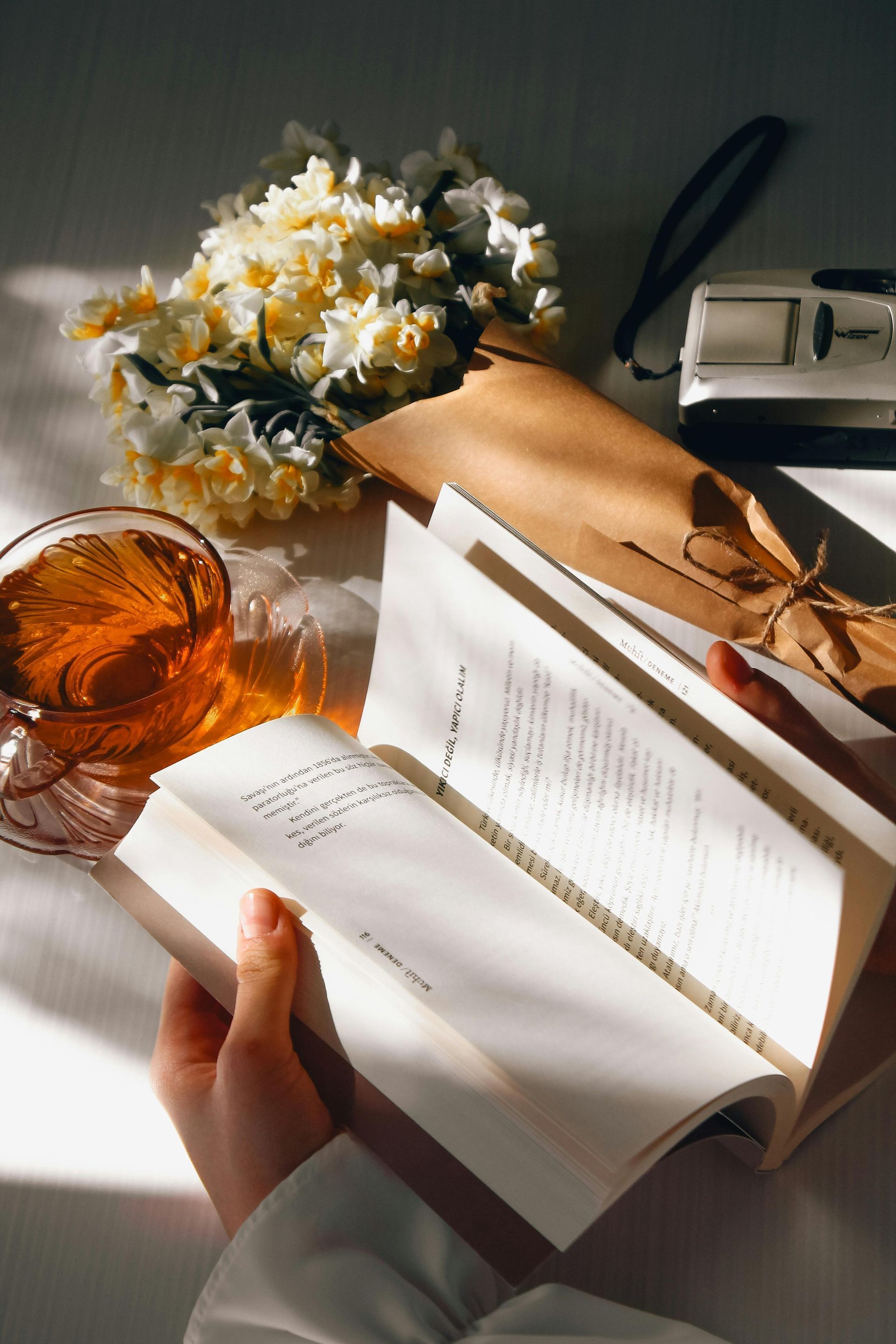 book, tea and flowers