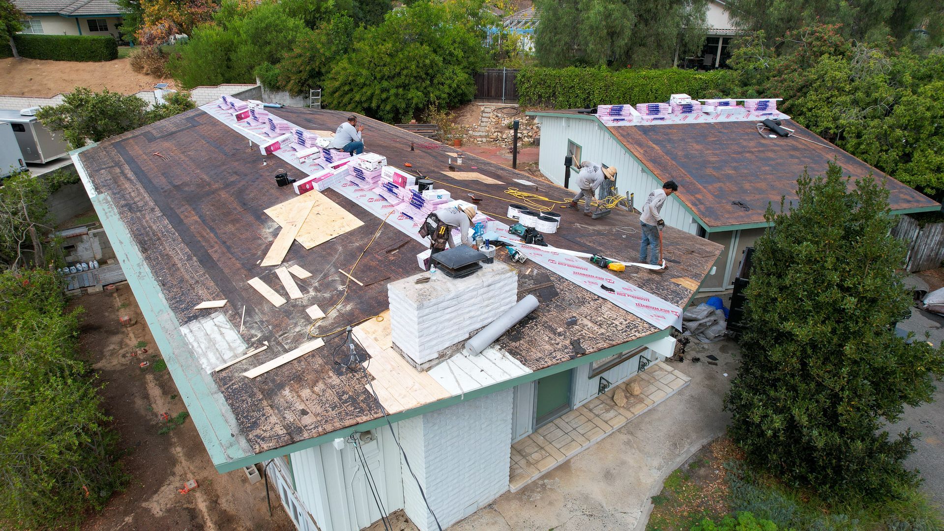 An aerial view of a house that is being remodeled