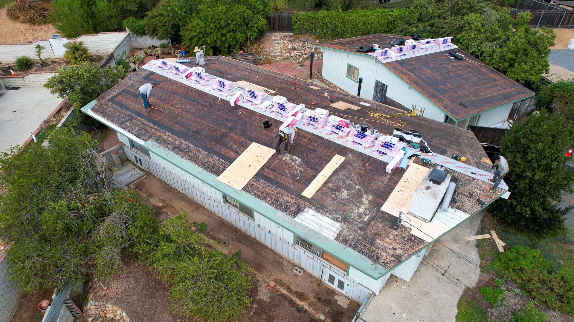 An aerial view of a house that is being remodeled