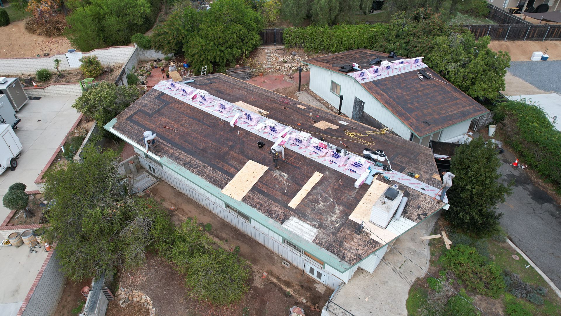 An aerial view of a house that is being remodeled