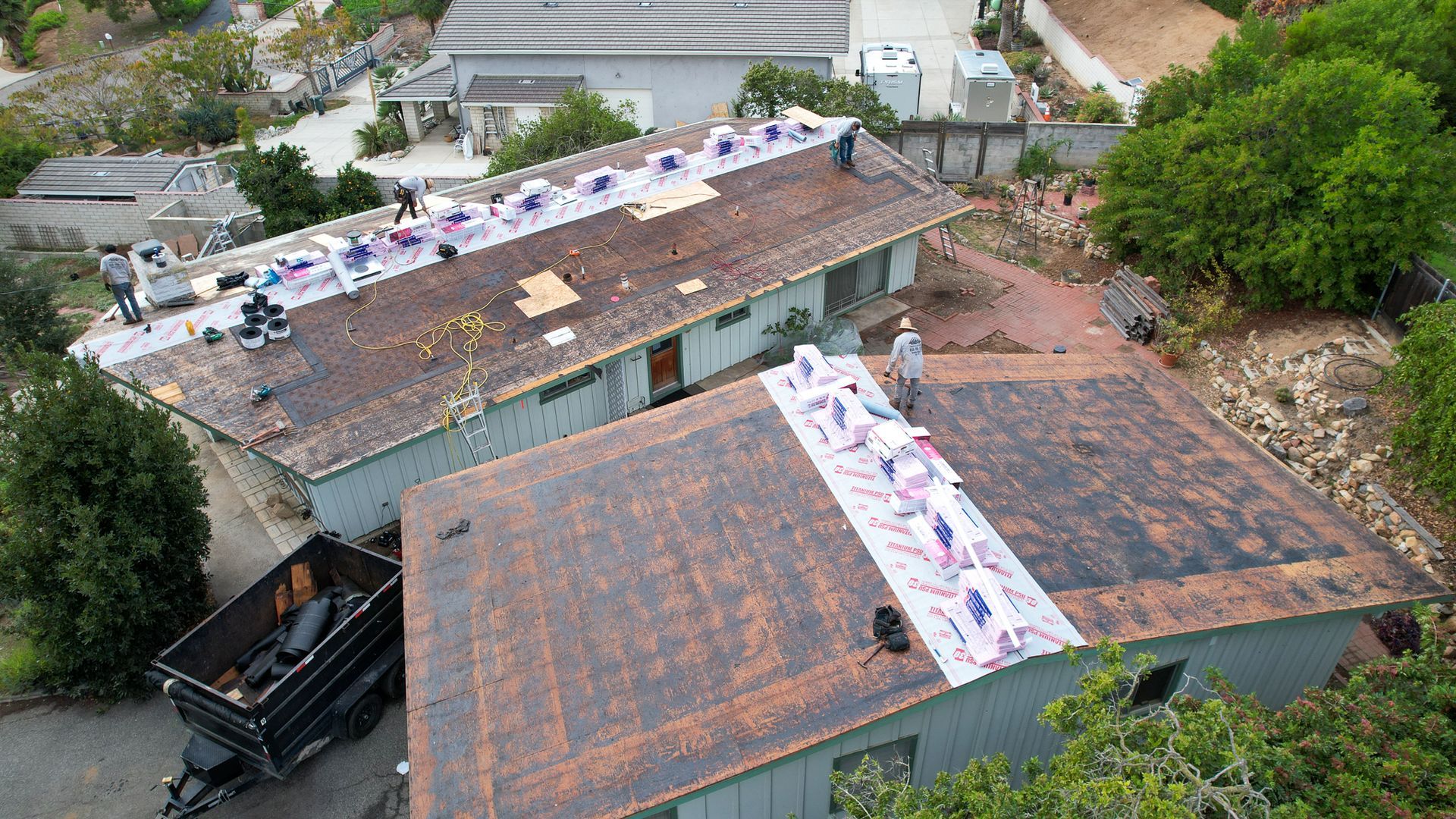 An aerial view of a house that is being remodeled