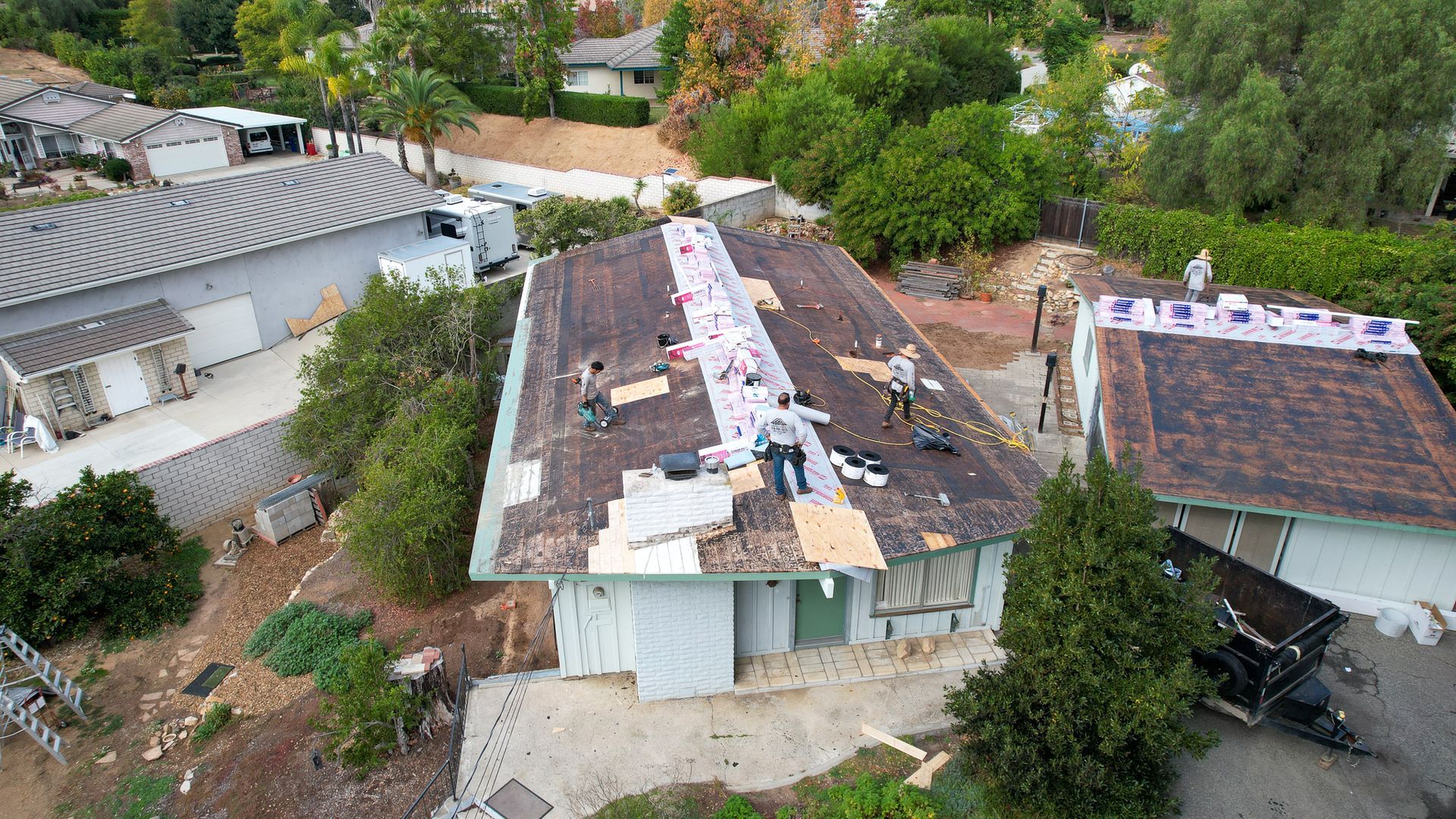 An aerial view of a house that is being remodeled
