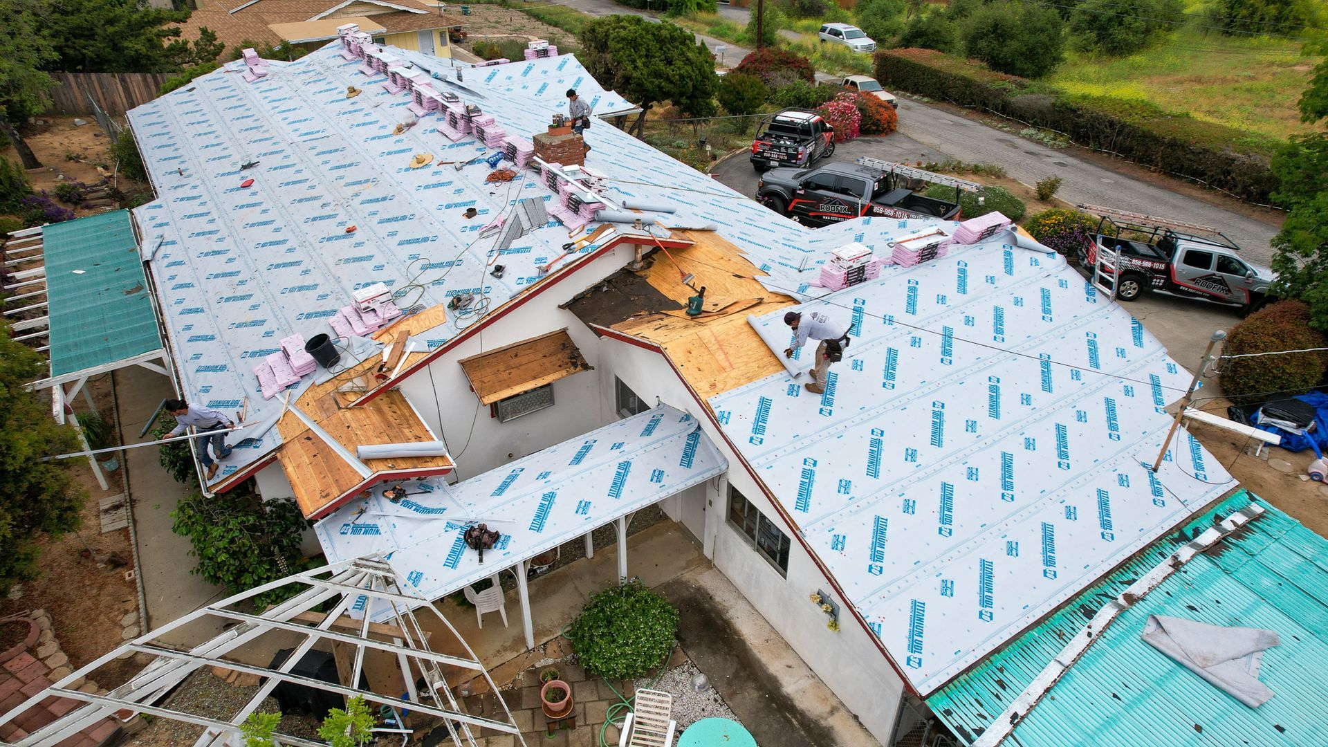 An aerial view of a house that is being remodeled