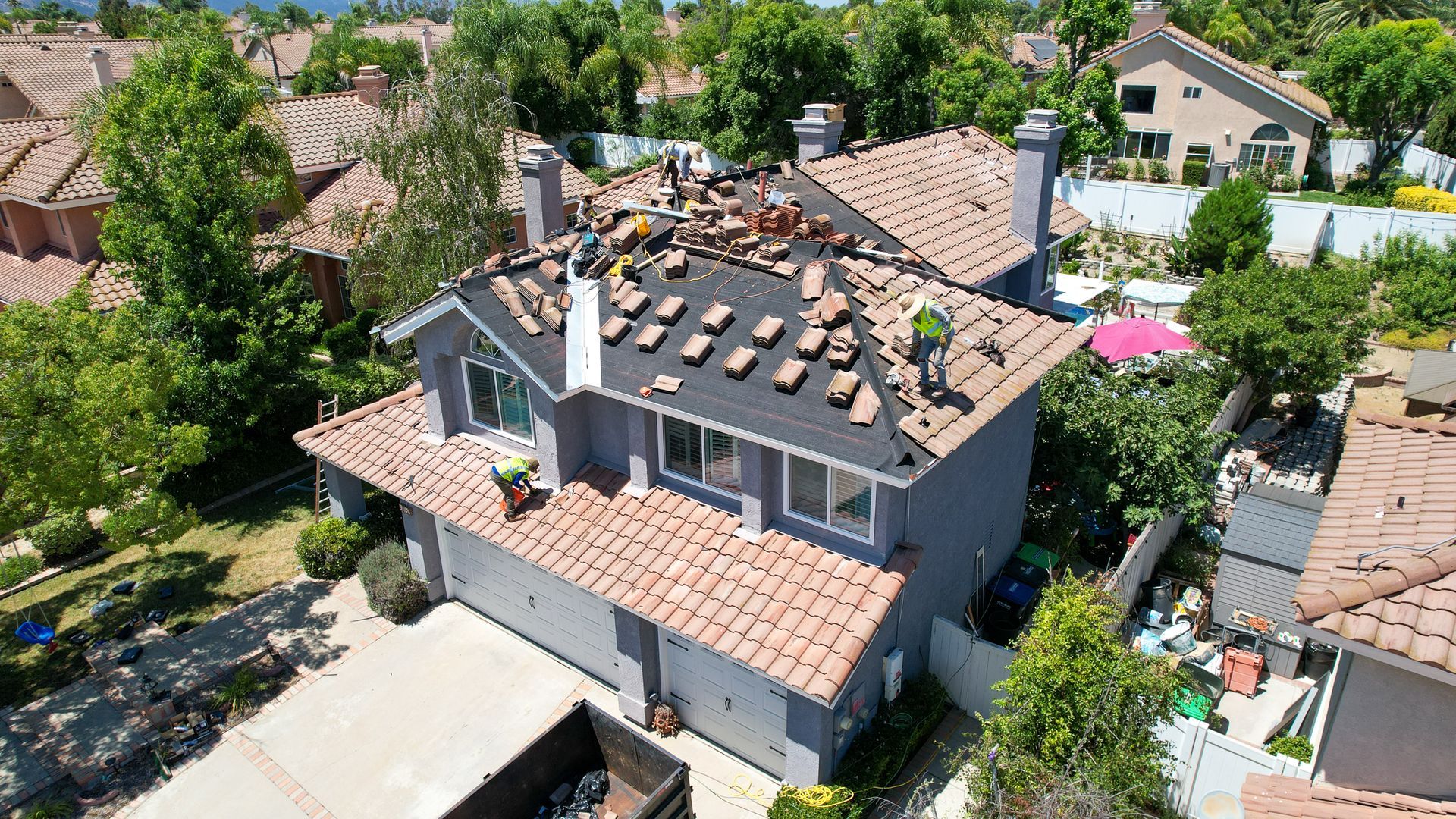 An aerial view of a house that is being remodeled