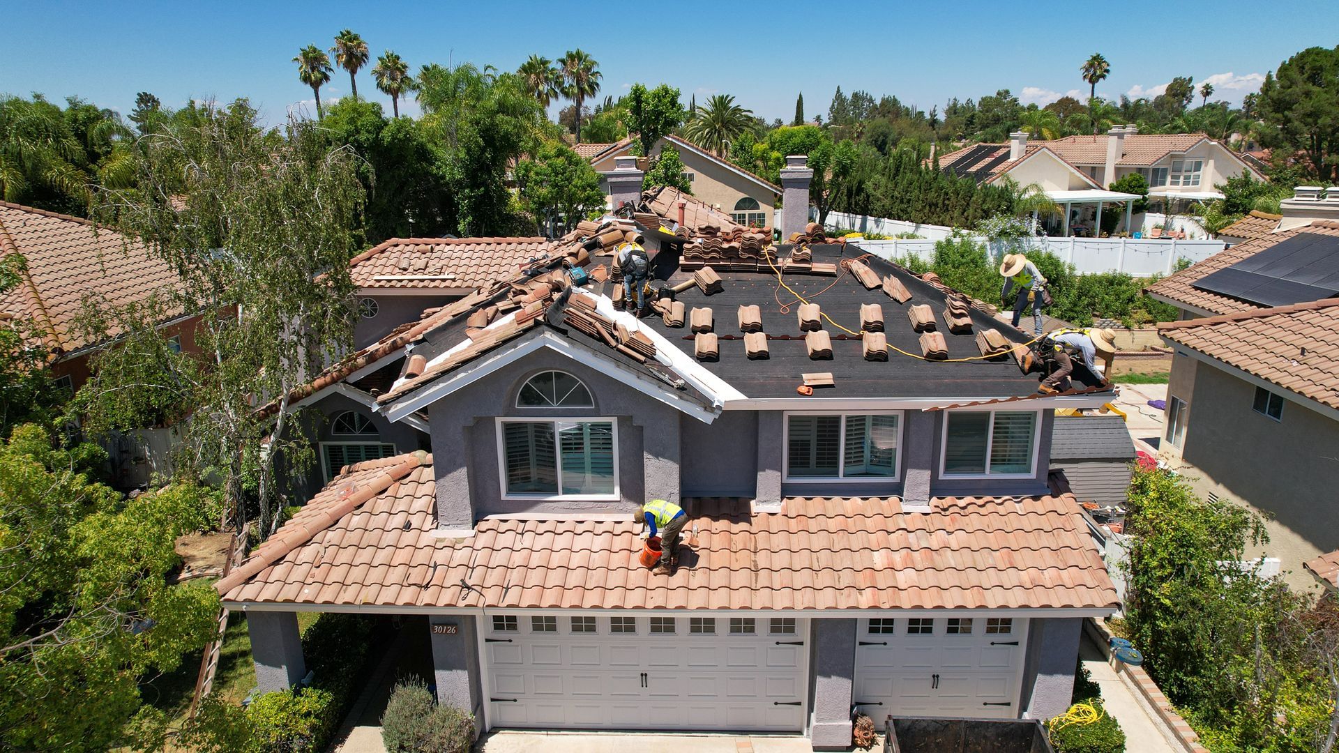 An aerial view of a house that is being remodeled