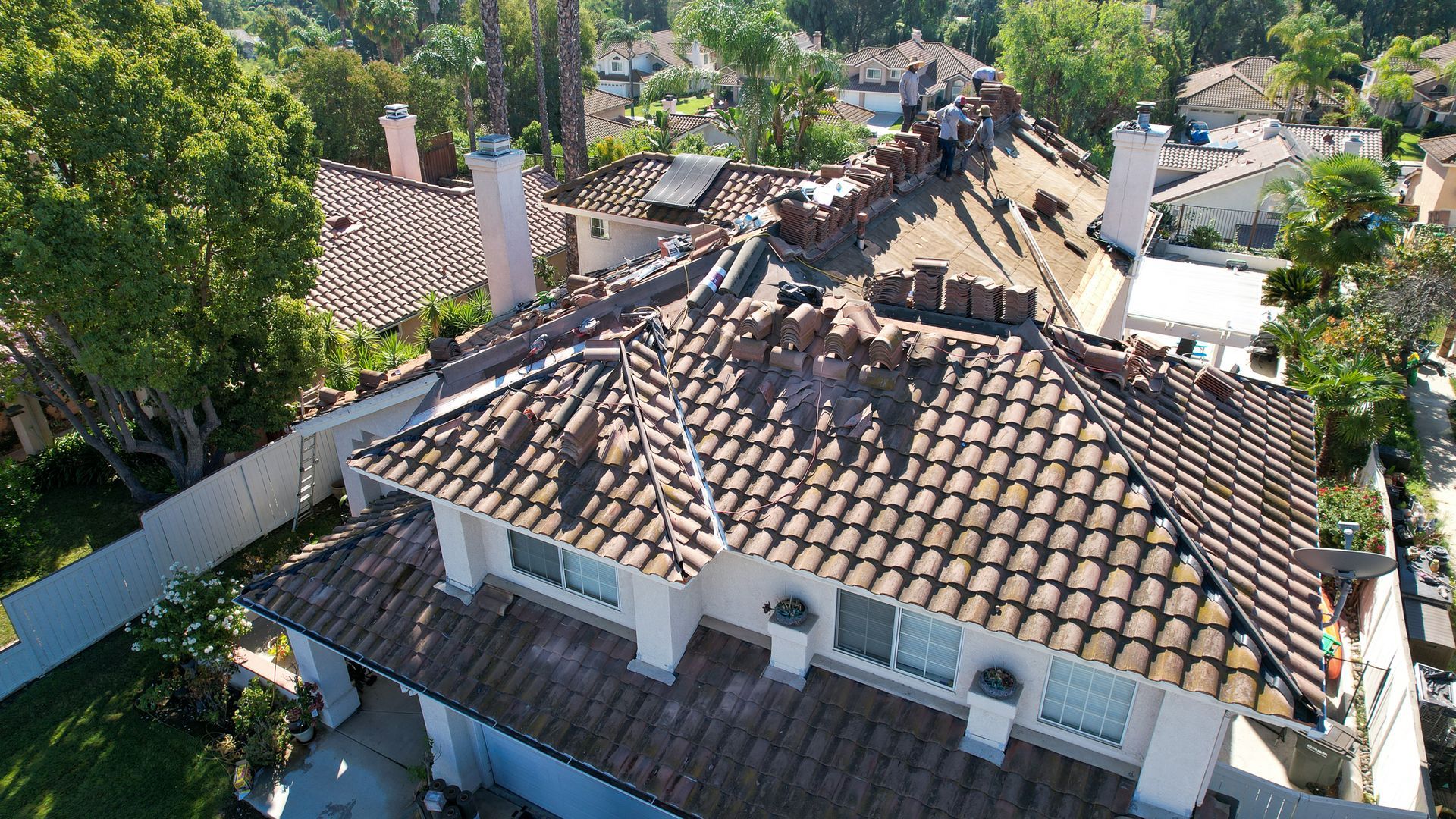 An aerial view of a house with a tiled roof