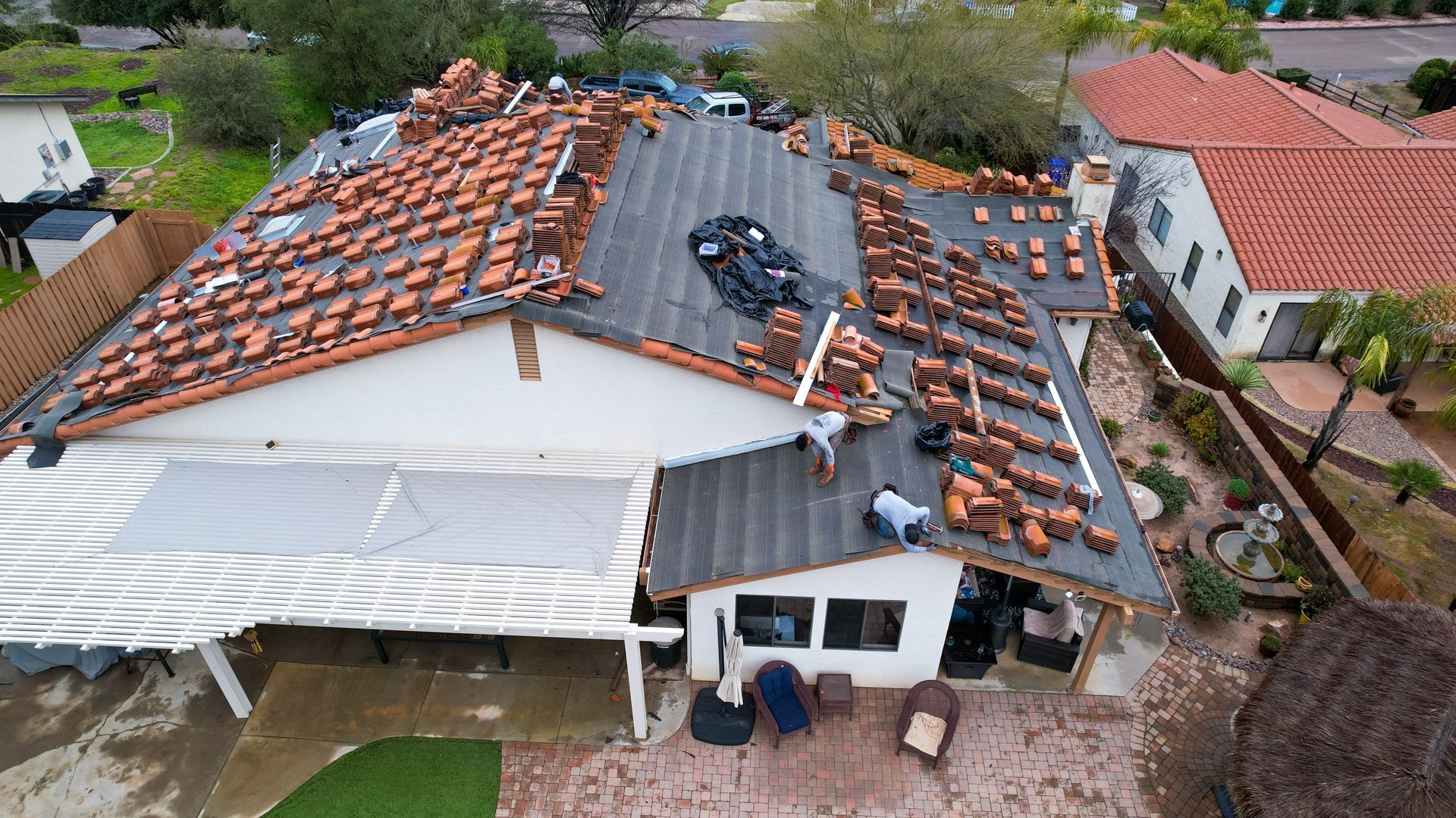 An aerial view of a house that is being remodeled