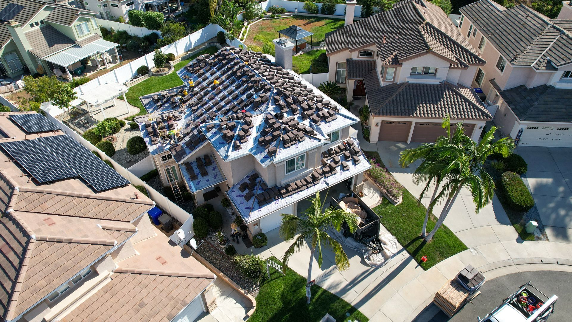 An aerial view of a house that is being remodeled