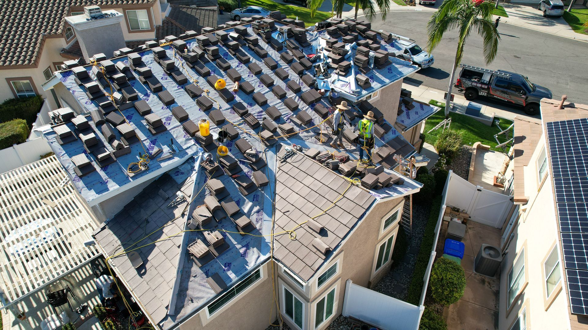 An aerial view of a house that is being remodeled