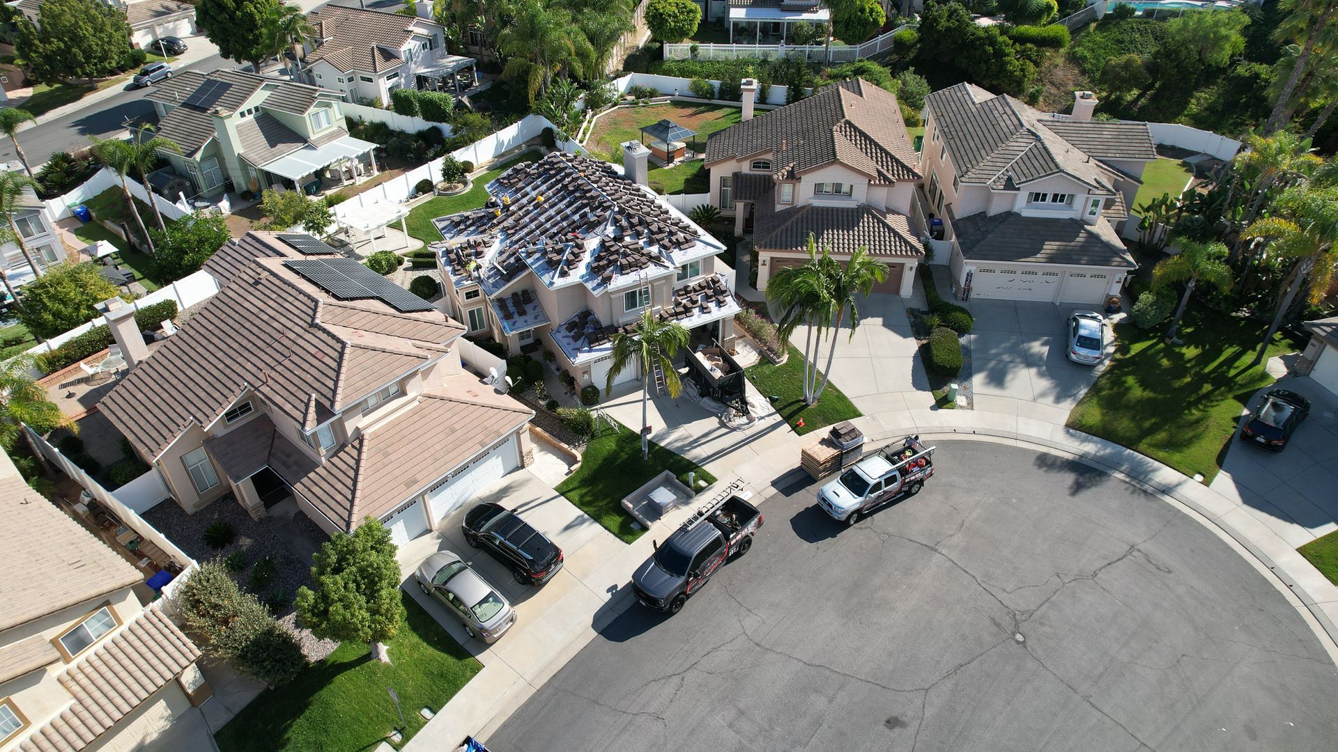 An aerial view of a residential area with lots of houses