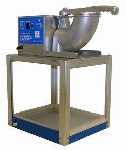 Blue and silver industrial machine with a hopper mounted on a beige metal stand