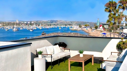 Rooftop deck with harbor and marina views at Harbor Lookout