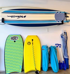Surfboards and boogie boards provided for guests
