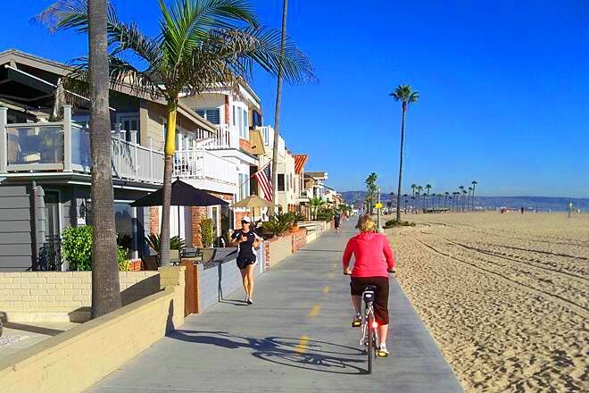 Cyclist on the Newport Beach boardwalk