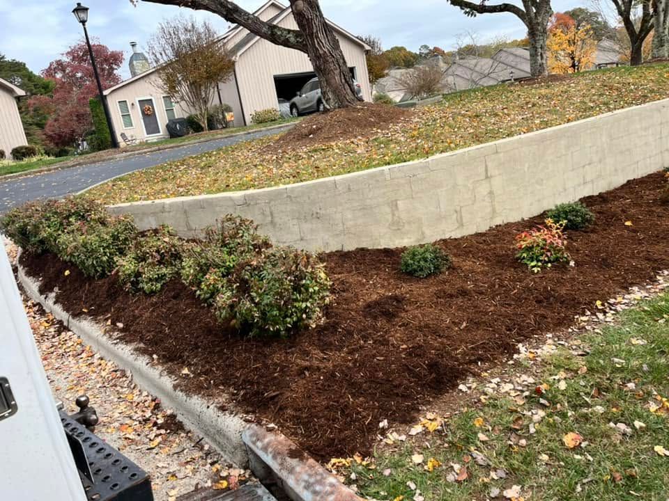 Paver patio with tight joint lines beside a trimmed lawn on a Catawba County property