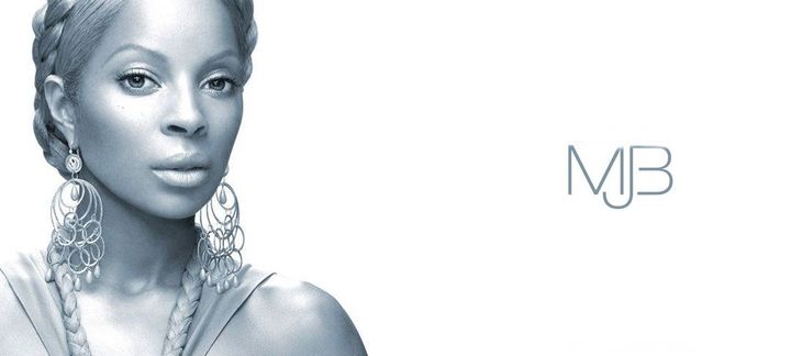a black and white photo of a woman wearing earrings