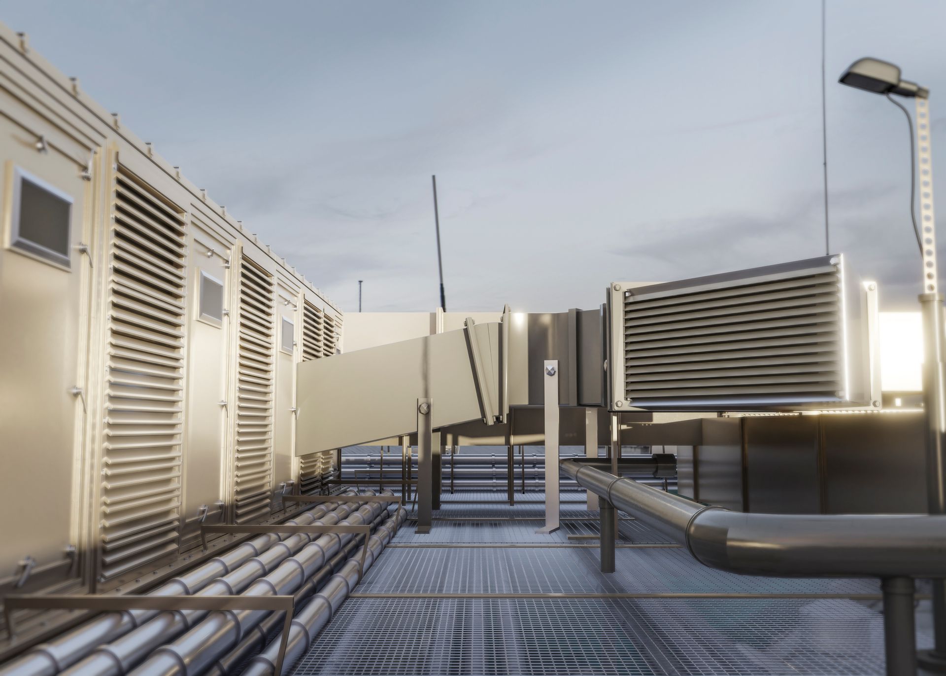 A rooftop with a lot of pipes and boxes on it.