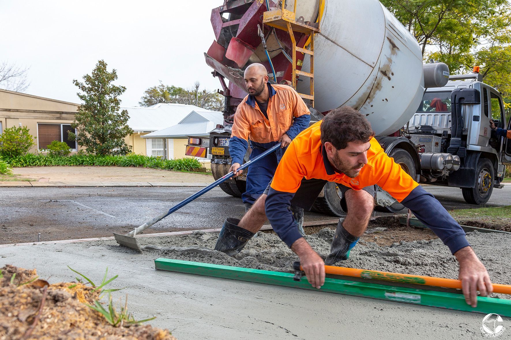 Two Horticulture Landscapers working with concrete 