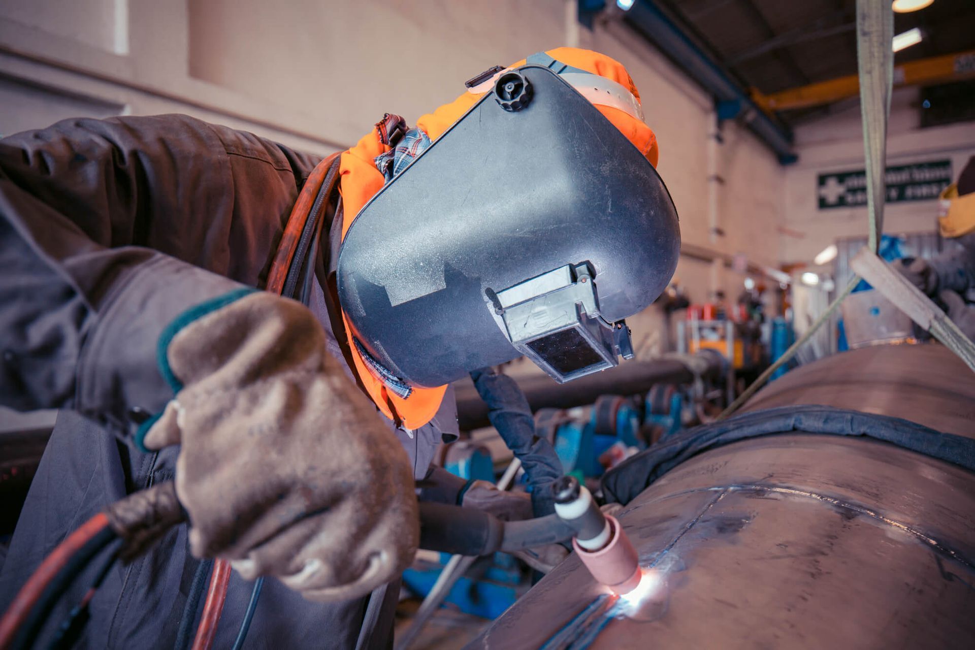 A person welding 