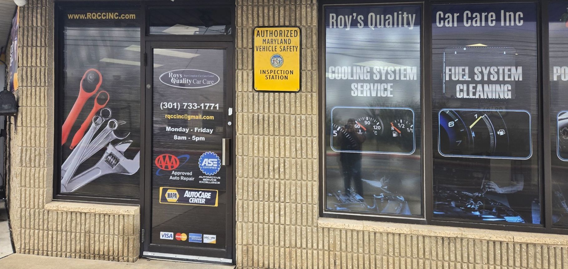 Roy 's quality car care is located in a small town