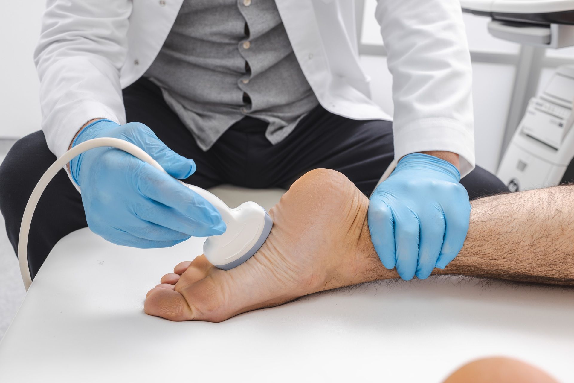 A person is getting a foot massage on a table.
