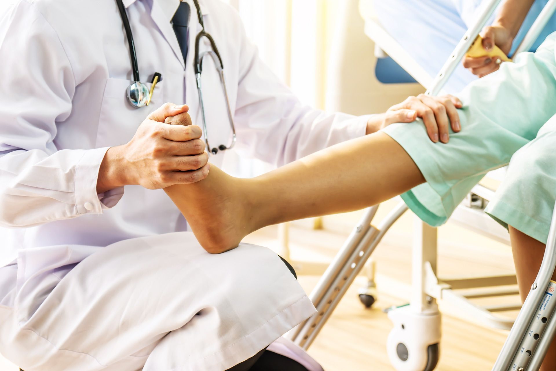 A doctor is talking to a patient while holding a clipboard.