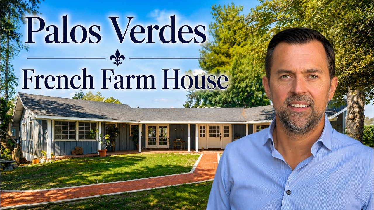 Palos Verdes French Farm House with a man standing in front of the home