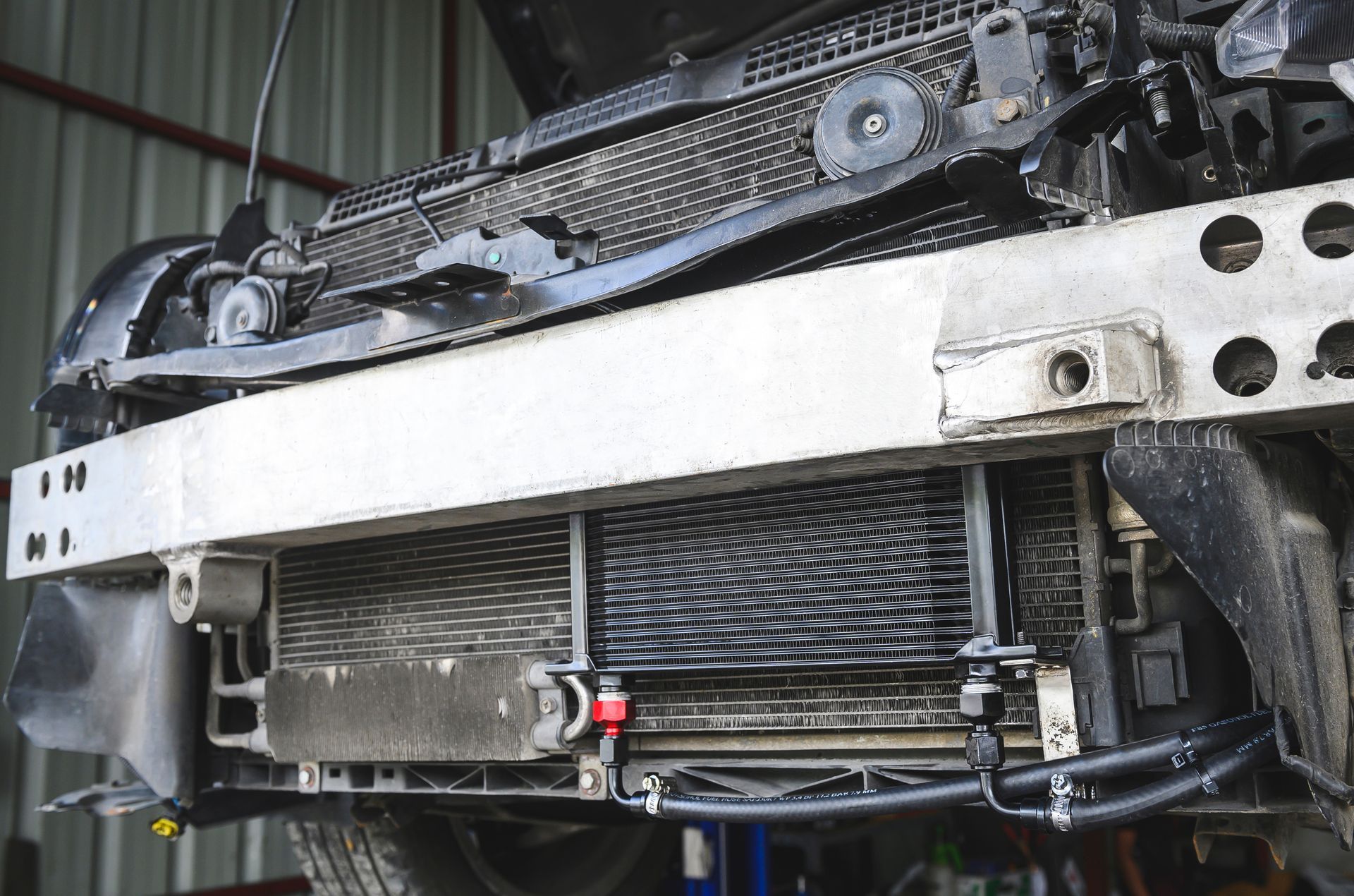 Red Car Engine With Dual Carburetors, Electric Fans, and Gold Brake Booster — R&B Automotive PTY LTD In Urangan, QLD