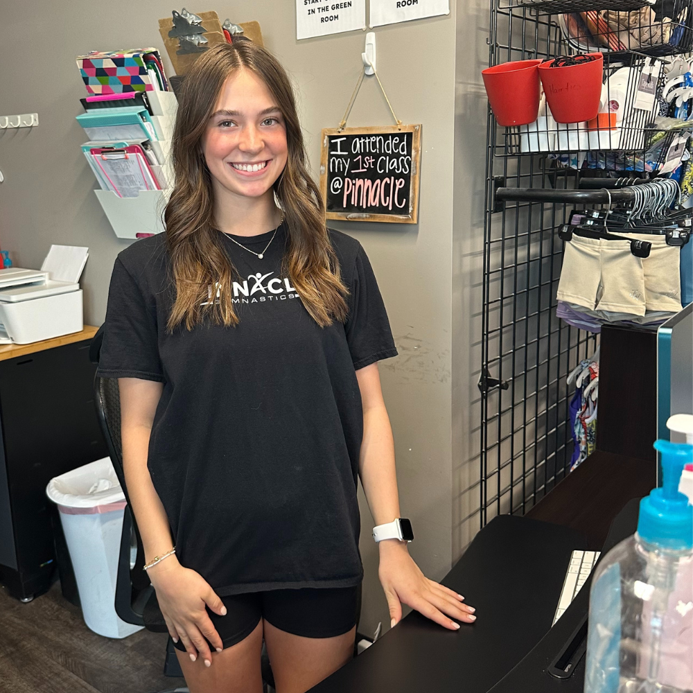 An employee working at the front desk.