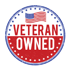 A red, white, and blue circular seal with an American flag icon and the text