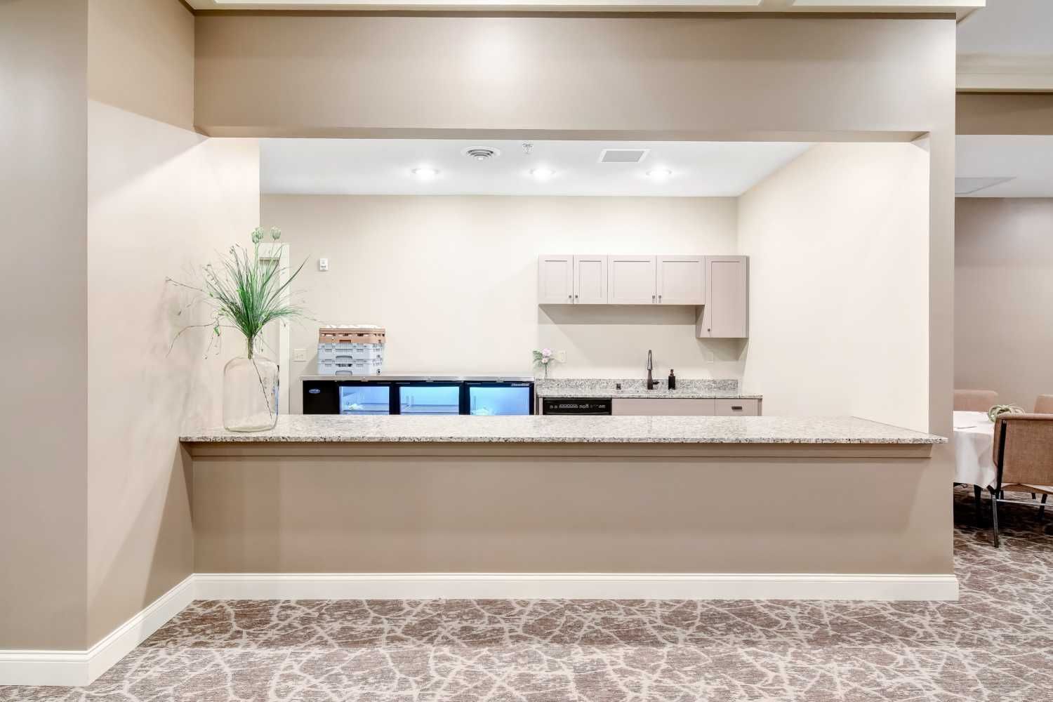 There is a large counter in the middle of the room.