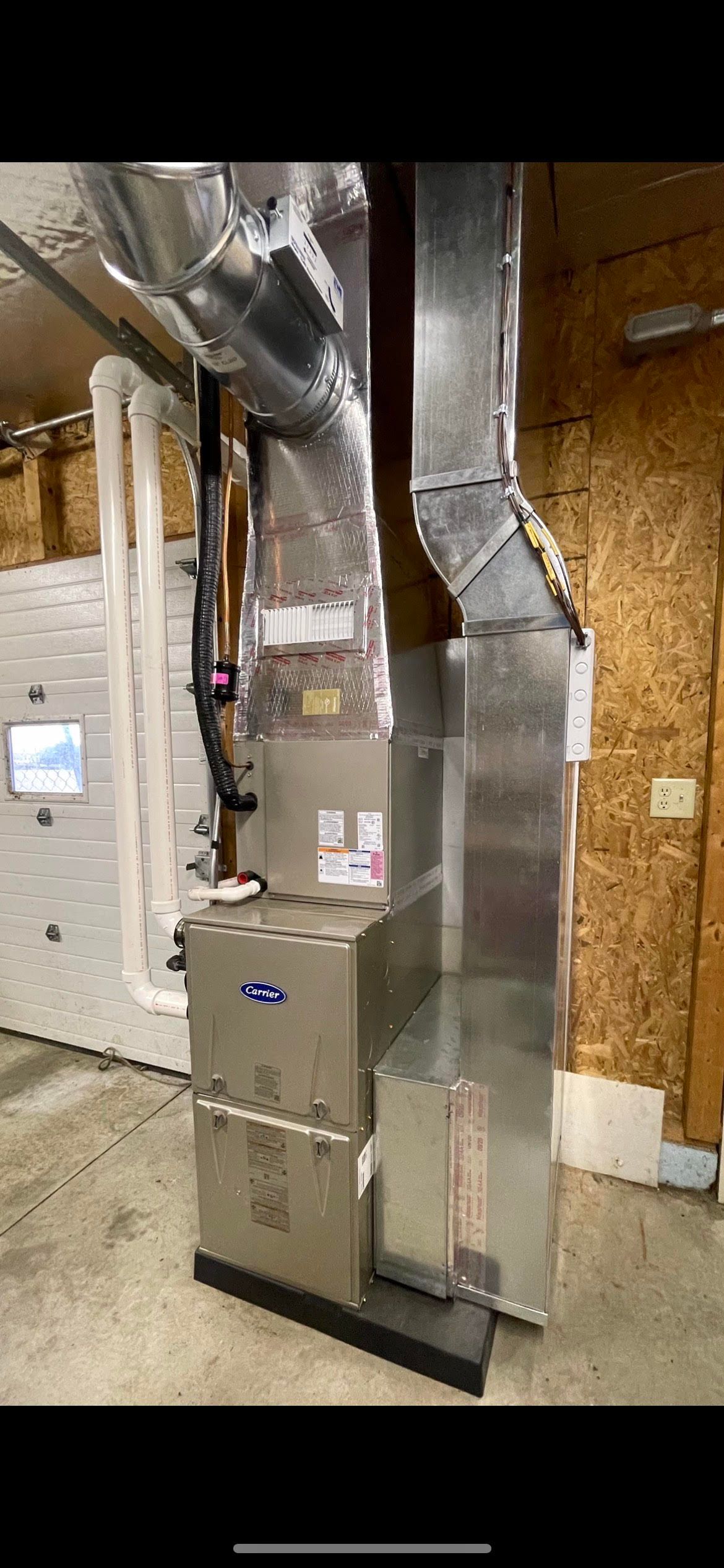 a picture of a heating and cooling system in a garage .