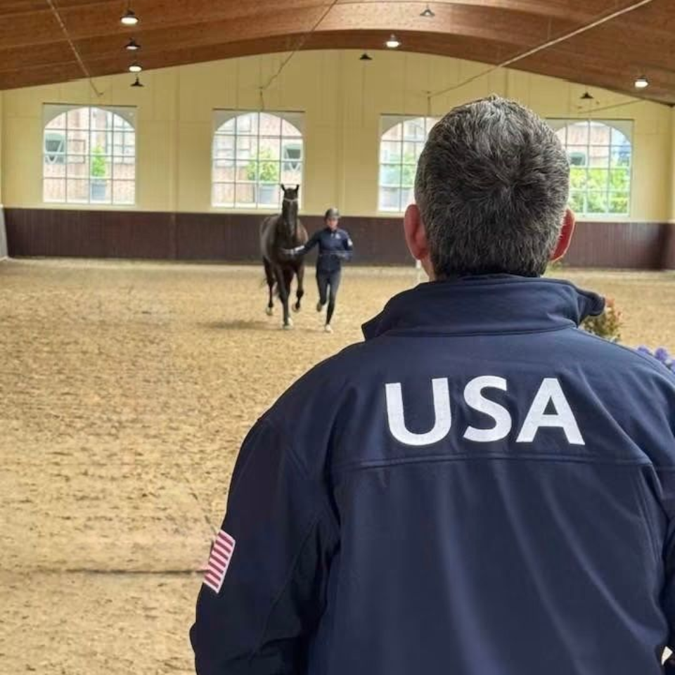 Dr. Fred Nostrant USEF veterinarian watching a horse jog in Germany