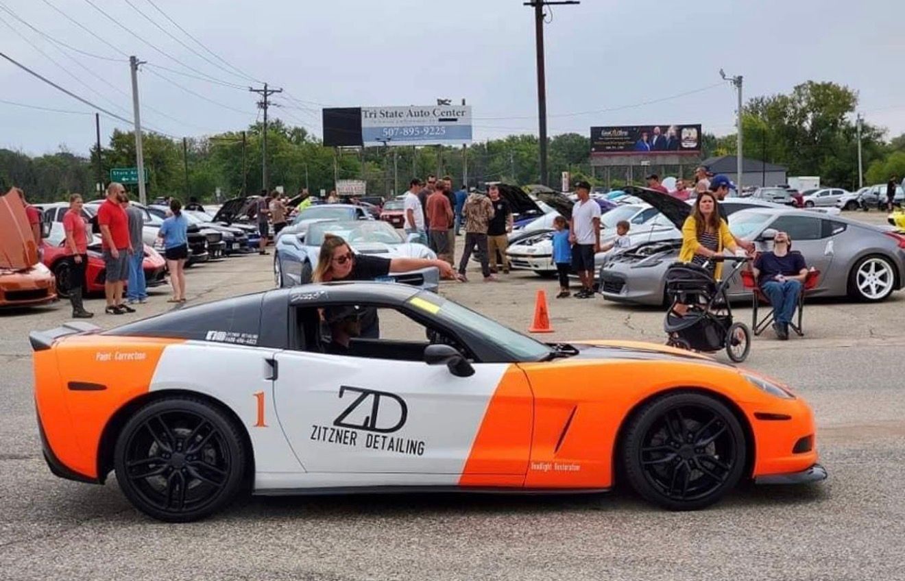 A white and orange sports car with