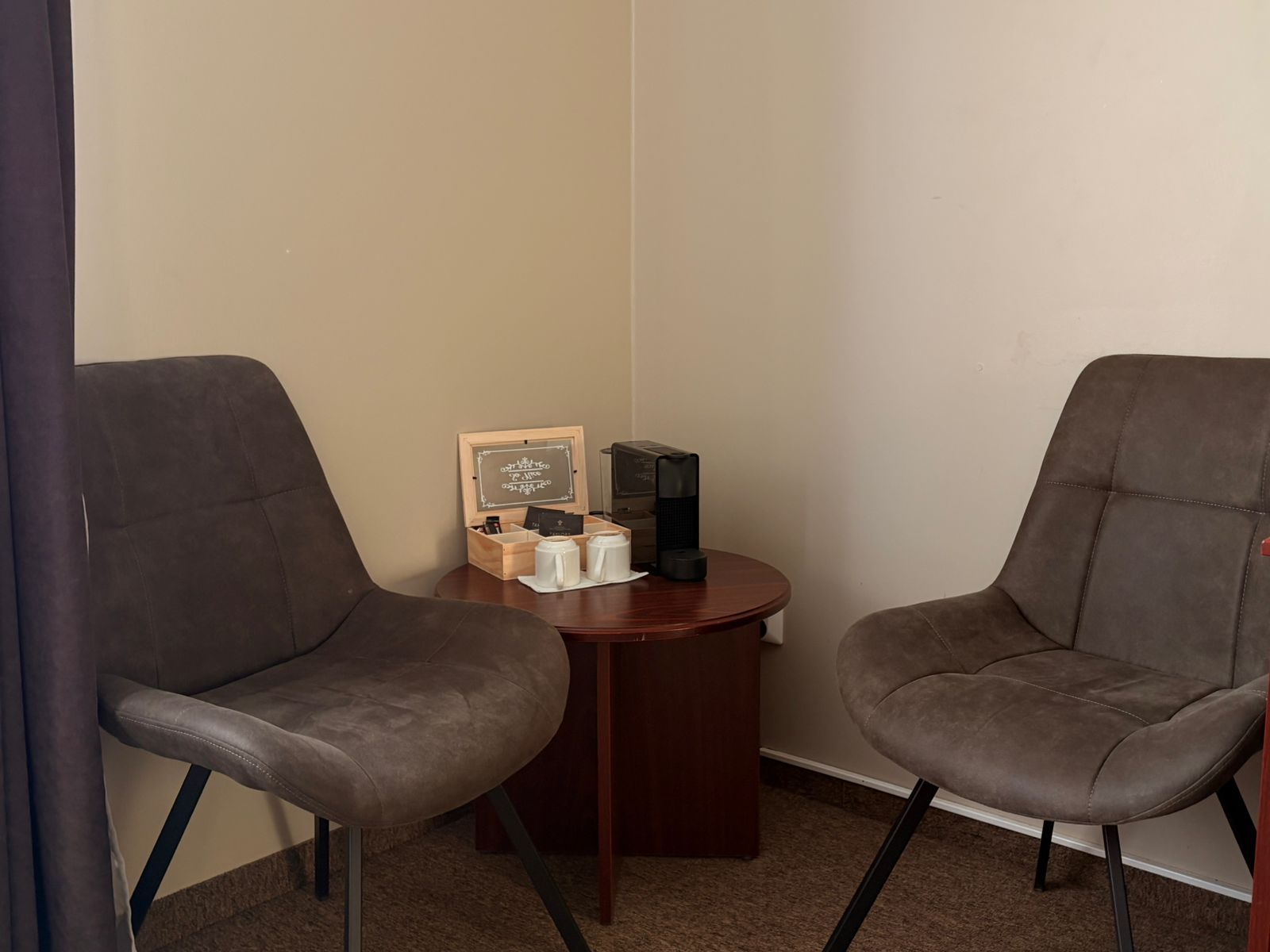 Standard double / twin picture showing the coffee and seating area.
