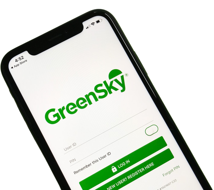 A cell phone with the greensky app open on it.